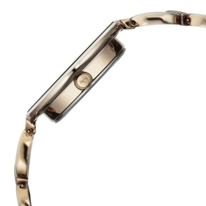 Gold watch with a white background