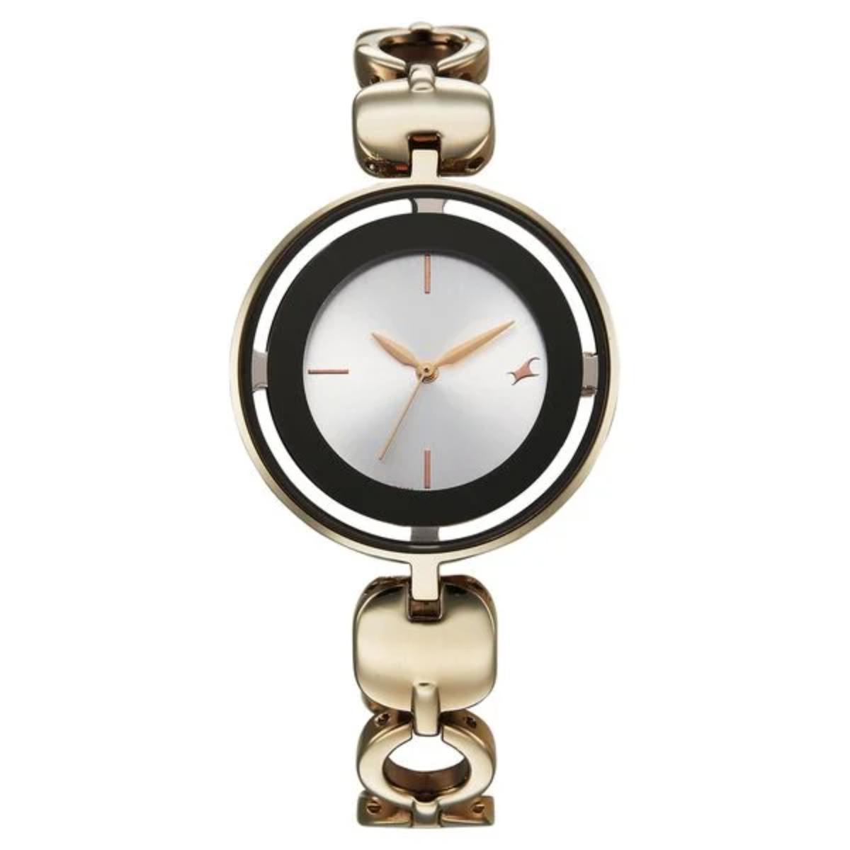Gold and black watch on a white background