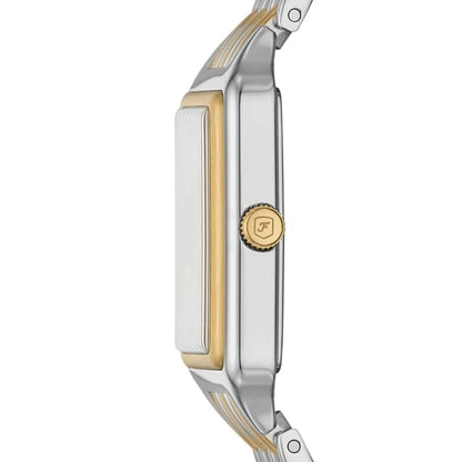 Close-up of a watch with a gold and silver band on a white background