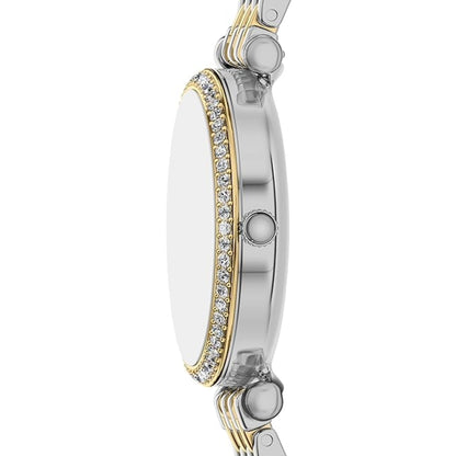 Close-up of a silver and gold watch with diamond accents on a white background