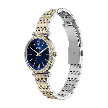 Two-tone Fossil watch with blue dial on a white background