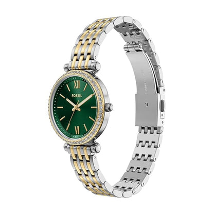 Fossil watch with two-tone metal band on a white background