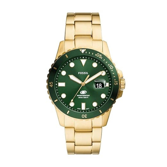 Gold watch with green dial on a white background