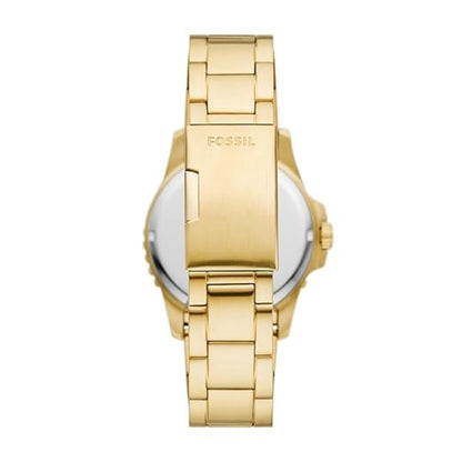 Gold Fossil watch on a white background