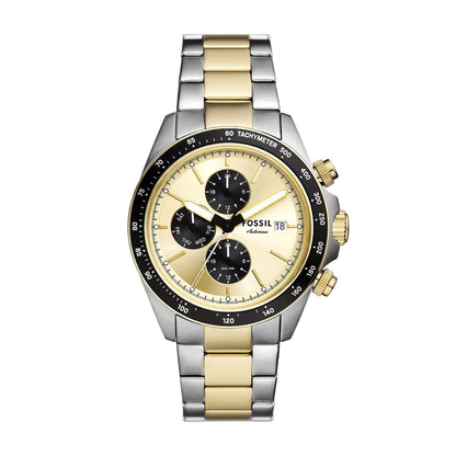 Two-tone Fossil watch with gold and silver band on a white background