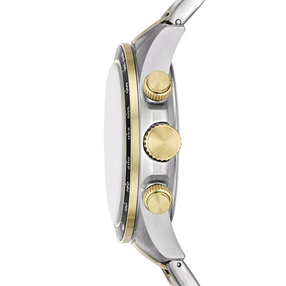 Close-up of a watch with gold and silver accents on a white background