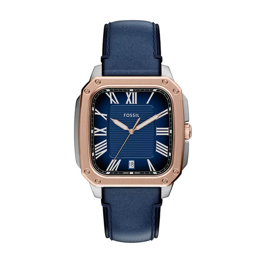Fossil watch with blue strap and rose gold case on white background