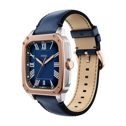 Fossil watch with blue and beige leather straps on a white background