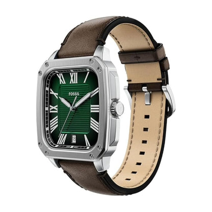 Fossil watch with green face and brown leather strap on white background