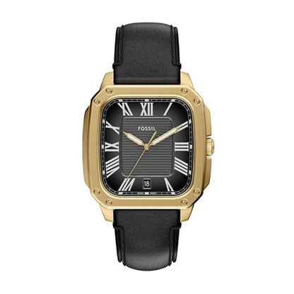 Fossil watch with black strap and gold case on a white background