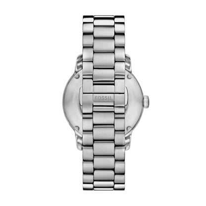 Silver Fossil watch with a detailed band on a white background