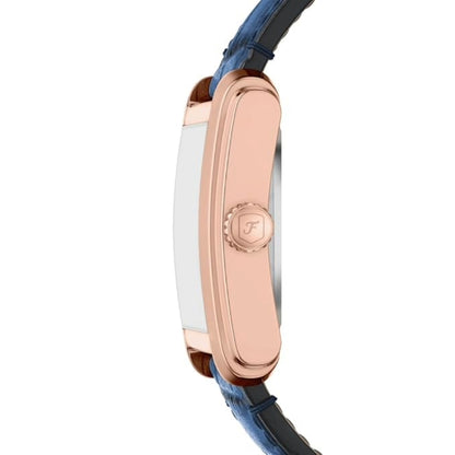 Close-up of a watch with rose gold case and blue strap on a white background