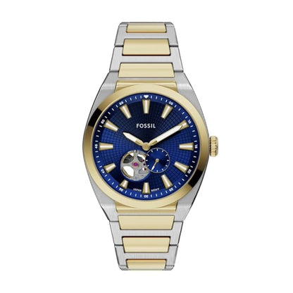 Two-tone Fossil watch with blue face on a white background