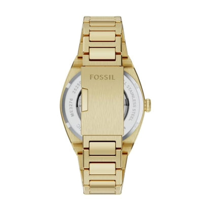 Gold Fossil watch on a white background