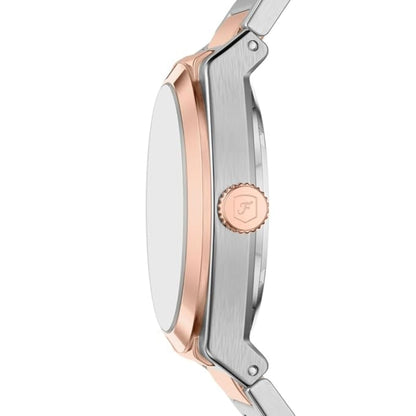 Close-up of a watch with rose gold and silver design on a white background