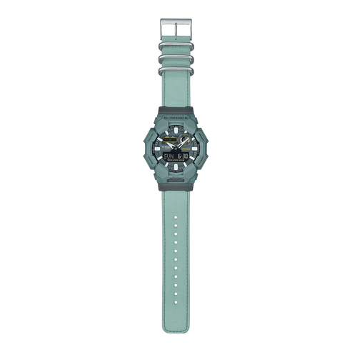 Green digital watch with a matching strap on a white background
