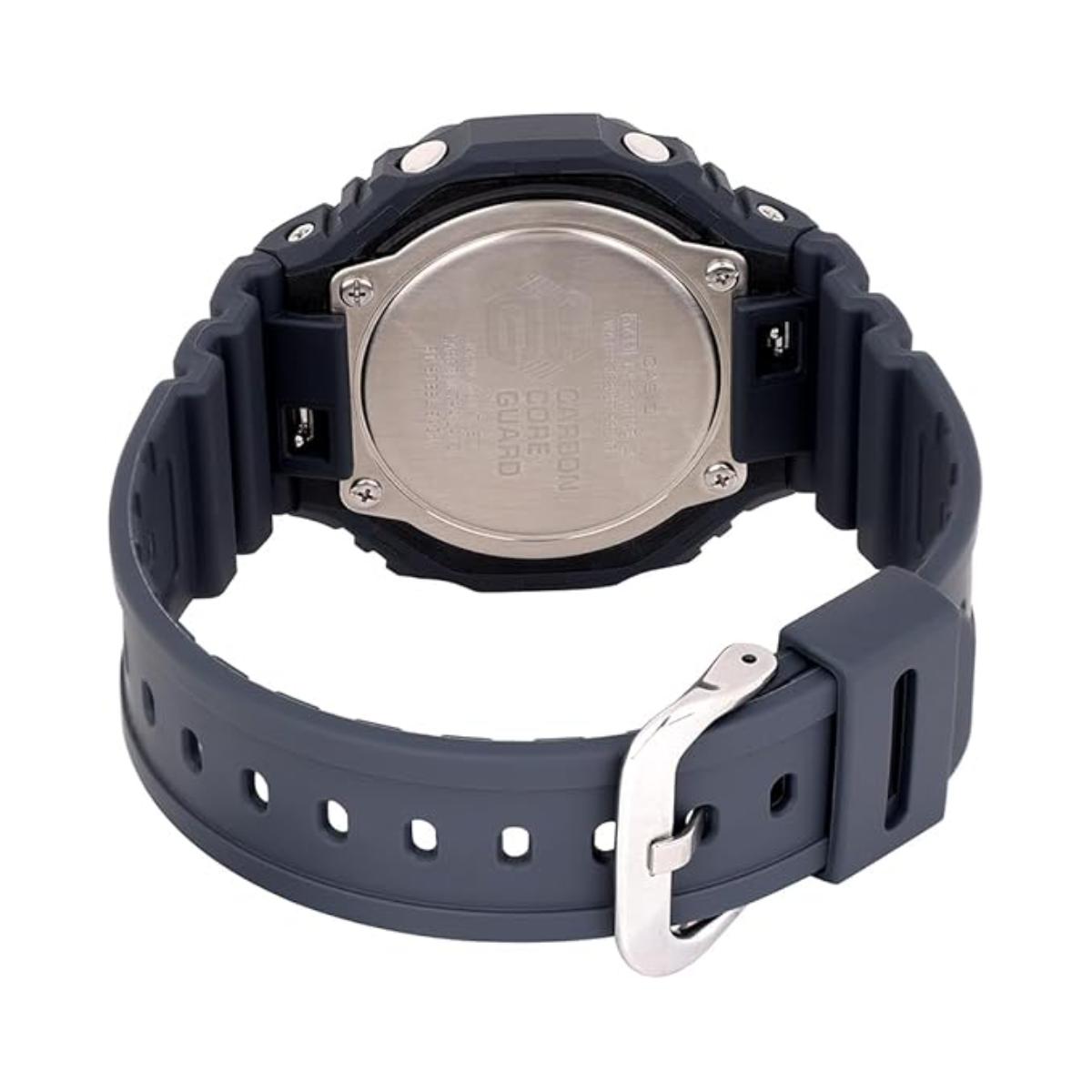 Back view of a Casio watch with a dark blue strap on a white background