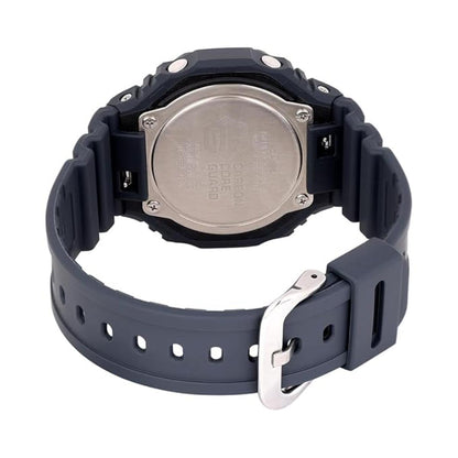 Back view of a Casio watch with a dark blue strap on a white background