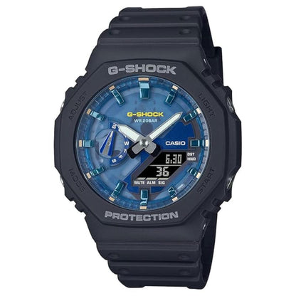 G-Shock watch with blue face and black casing on a white background