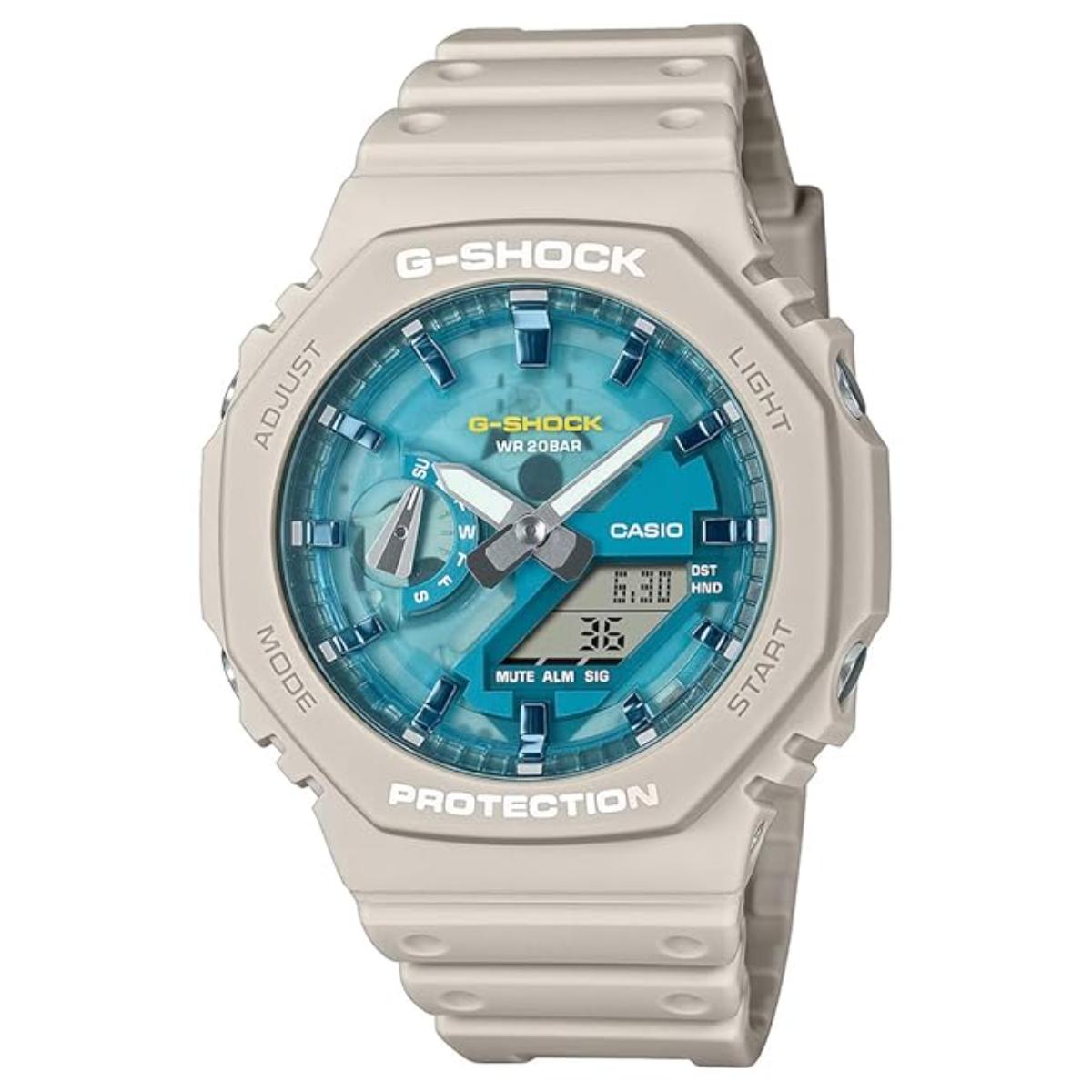 G-Shock watch with blue face and beige casing on a white background