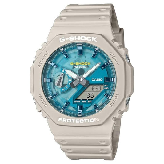 G-Shock watch with blue face and beige casing on a white background