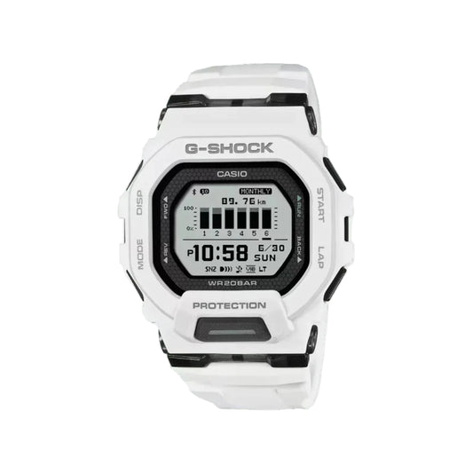 White Casio G-Shock digital watch on a light gray background