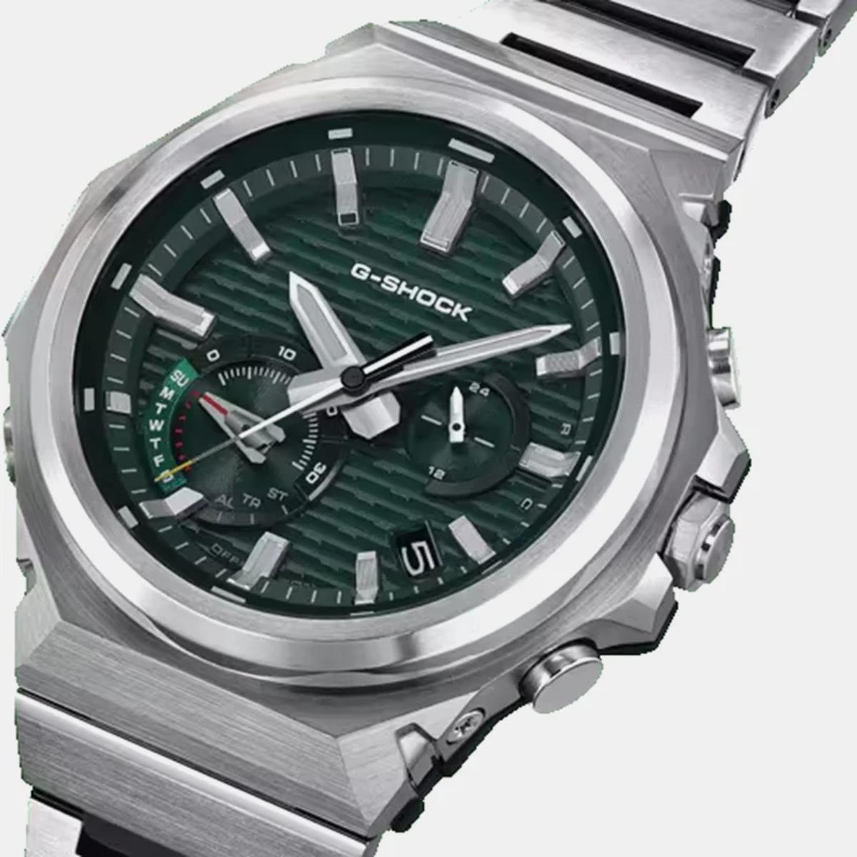 G-Shock watch with green face and silver case on a white background
