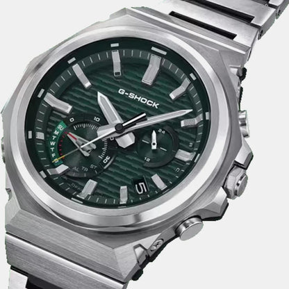 G-Shock watch with green face and silver case on a white background