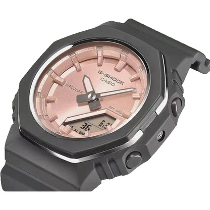 G-Shock Casio watch with pink face and gray case on a light gray background