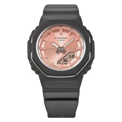 Black Casio G-Shock watch with a pink face on a white background