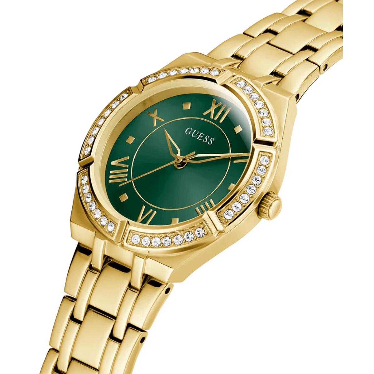 Gold watch with green dial and diamond accents on a white background