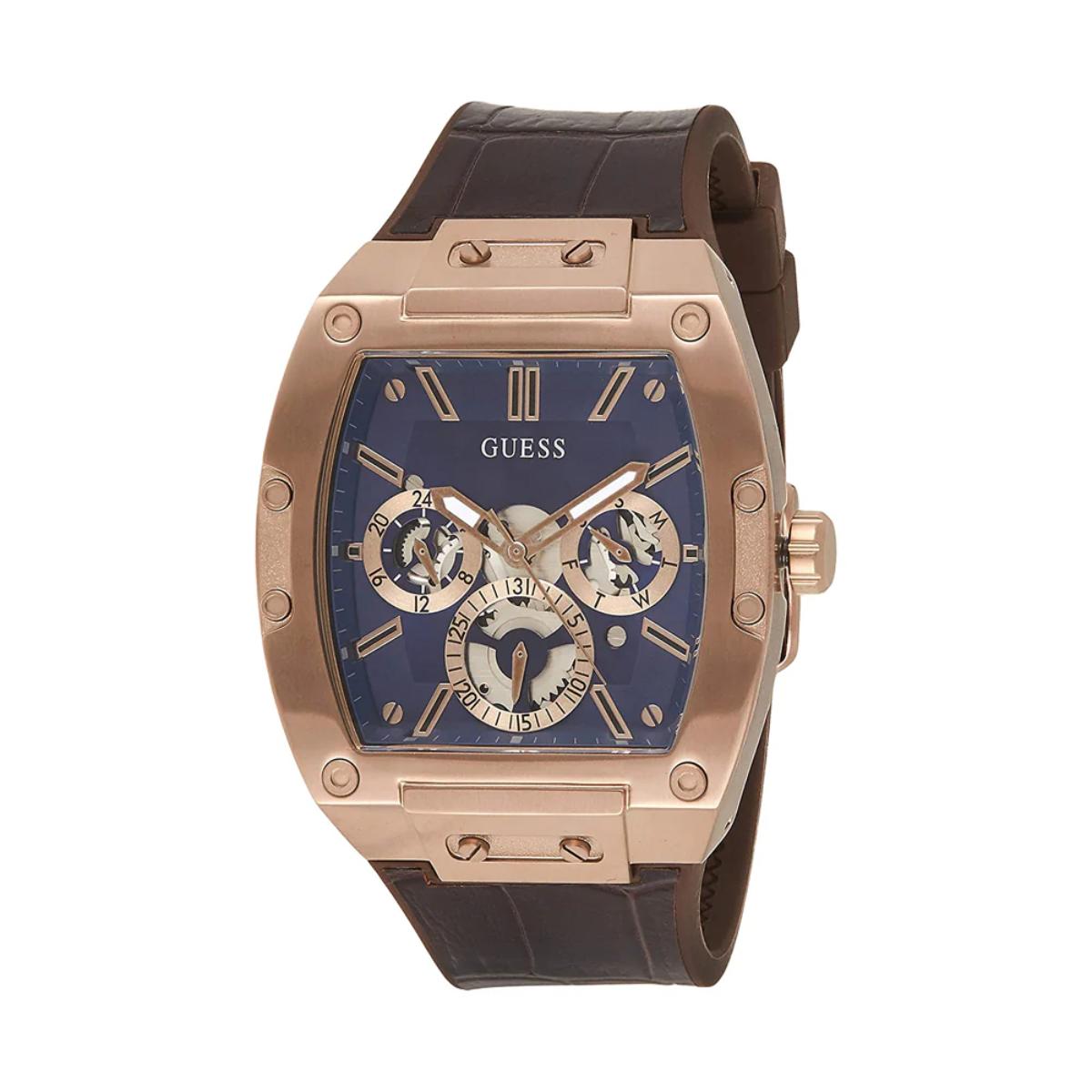 Guess watch with rose gold case and brown leather strap on a white background