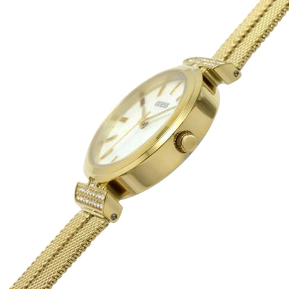 Gold watch with a mesh strap on a light gray background