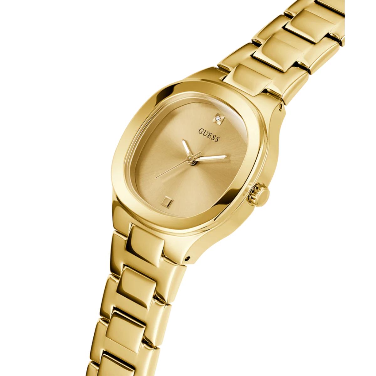 Gold watch with 'GUESS' branding on a white background