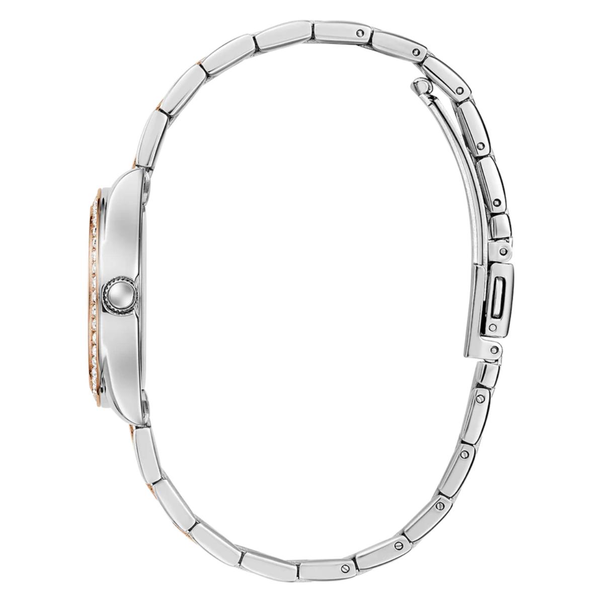 Close-up of a silver watch band on a white background