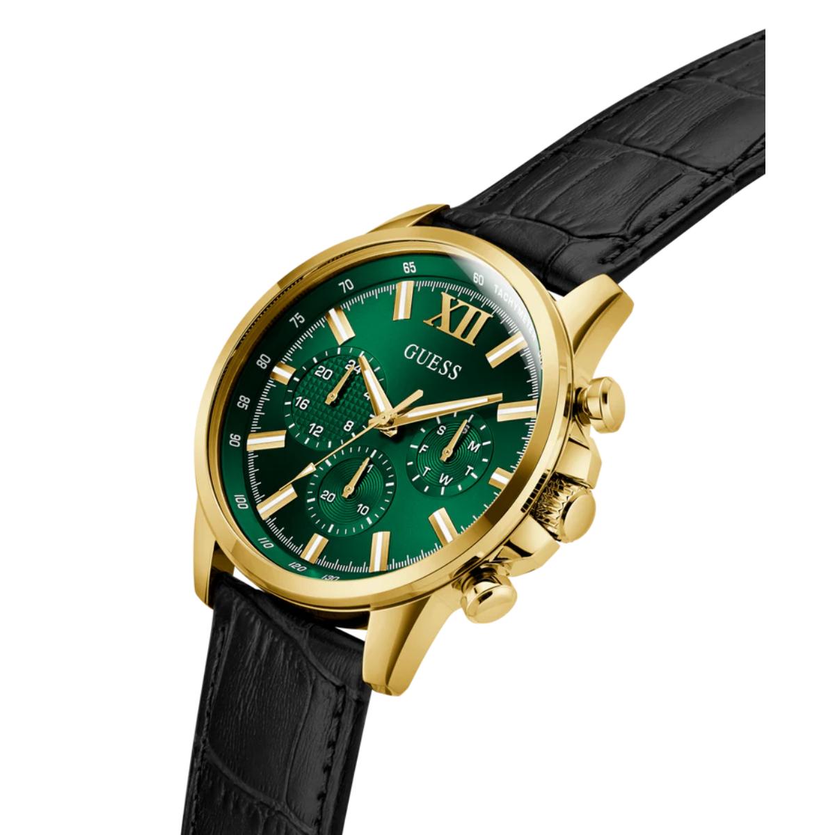 Watch with green face, gold case, and black leather strap on a white background