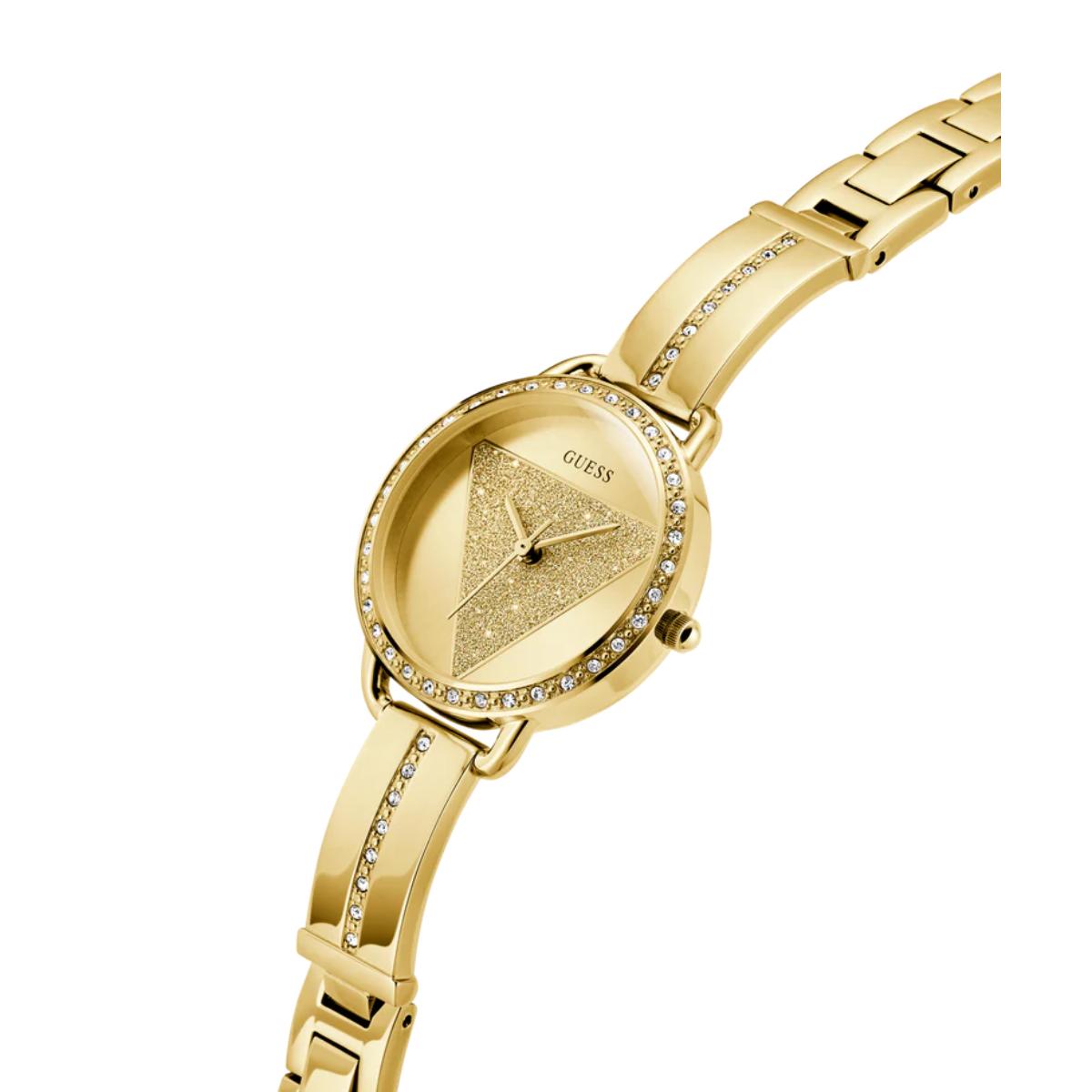 Gold watch with heart-shaped face on a white background