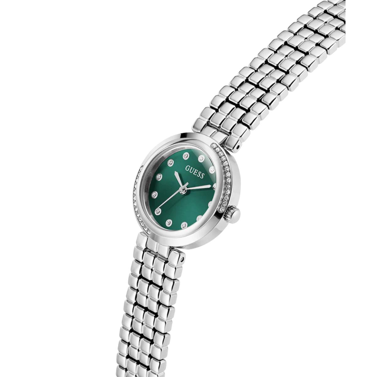 Silver watch with a green face on a white background