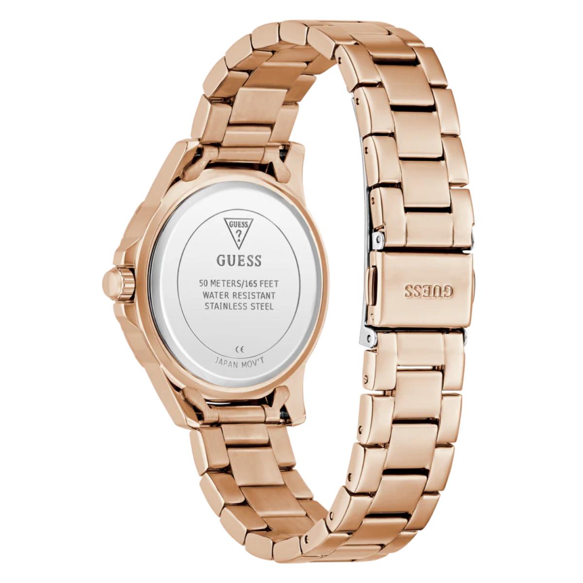 Rose gold watch with visible Guess branding on a white background