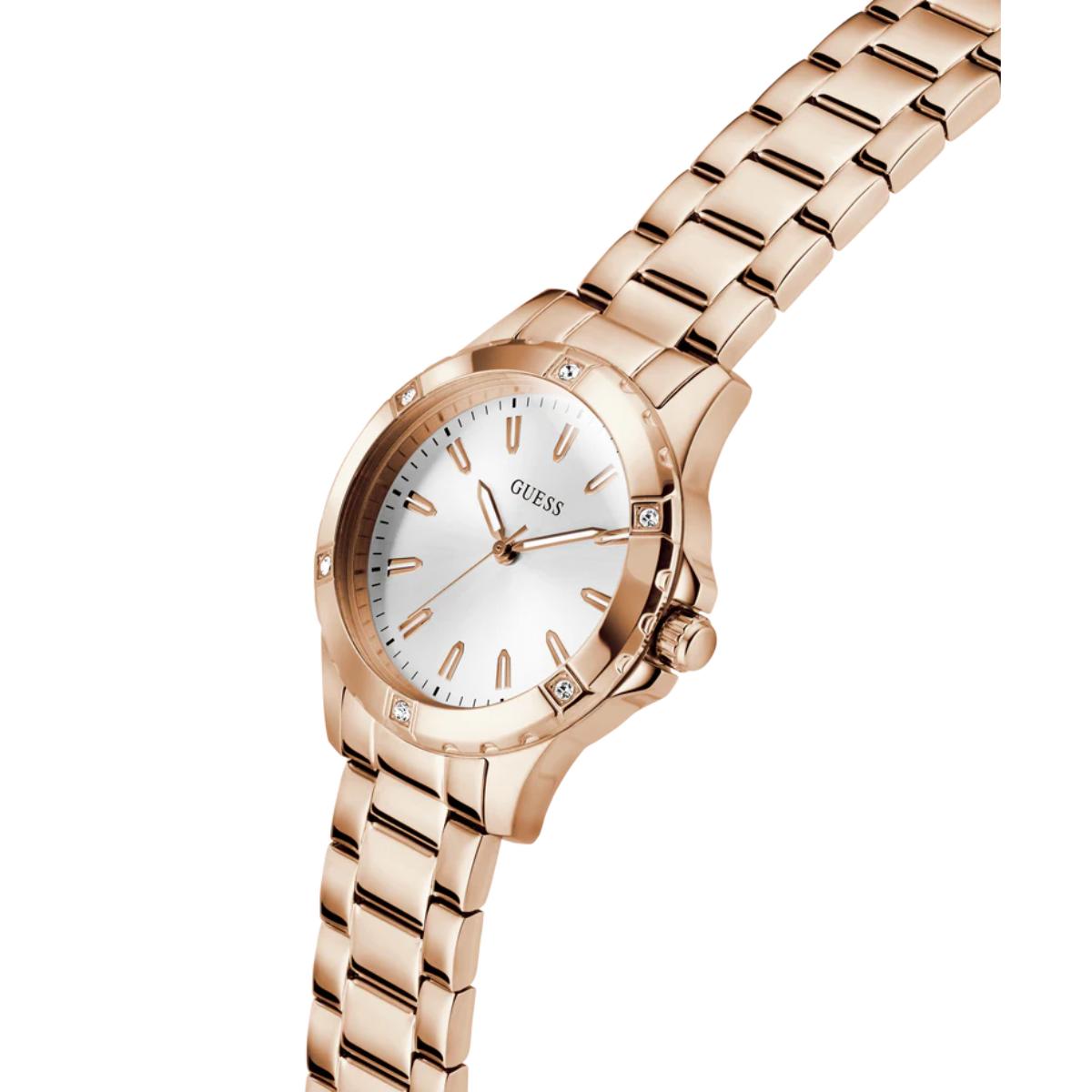 Rose gold watch with a white face on a white background