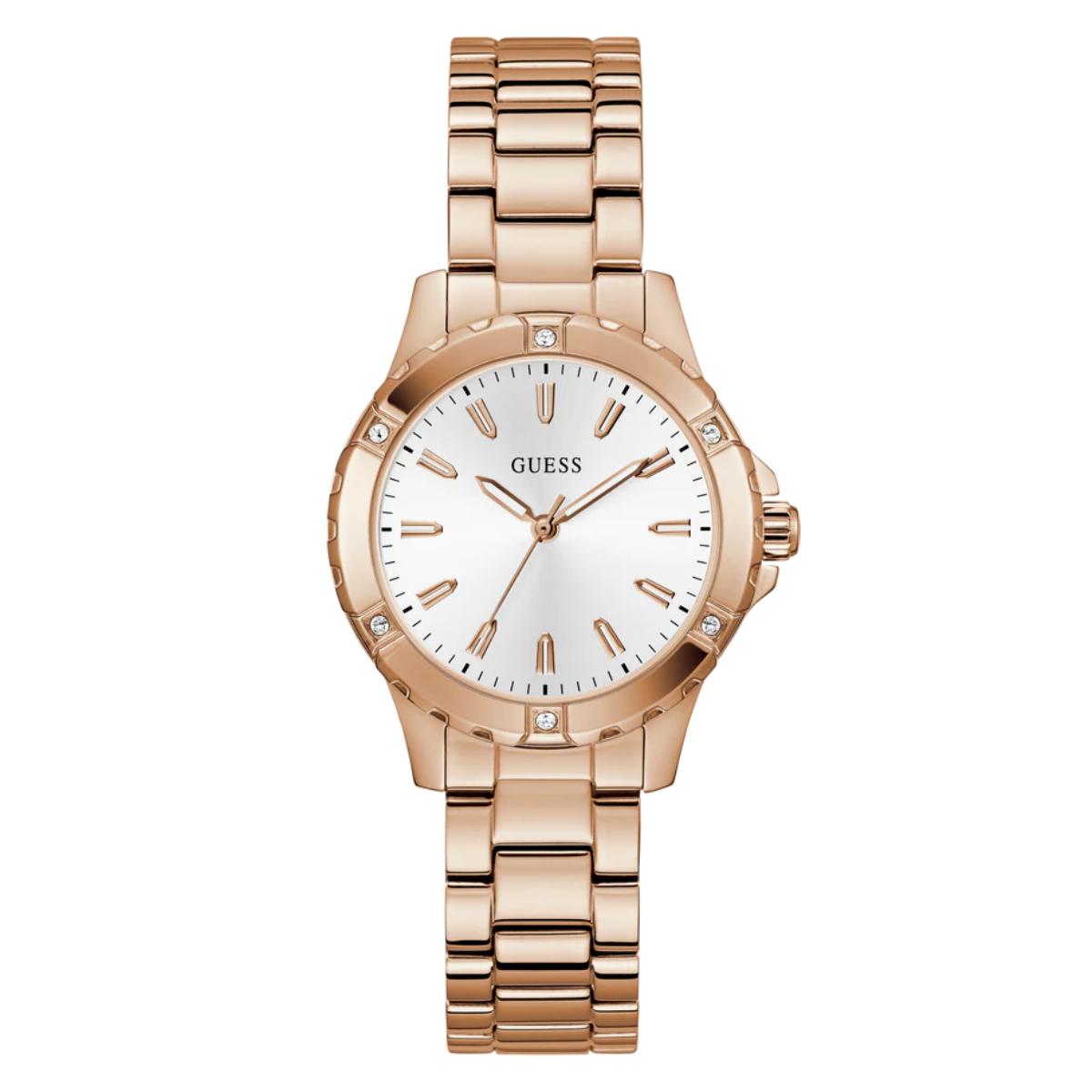A GUESS women's analog watch with a rose gold metal bracelet and case, featuring a white dial with rose gold indices and crystal accents on the bezel and lugs.