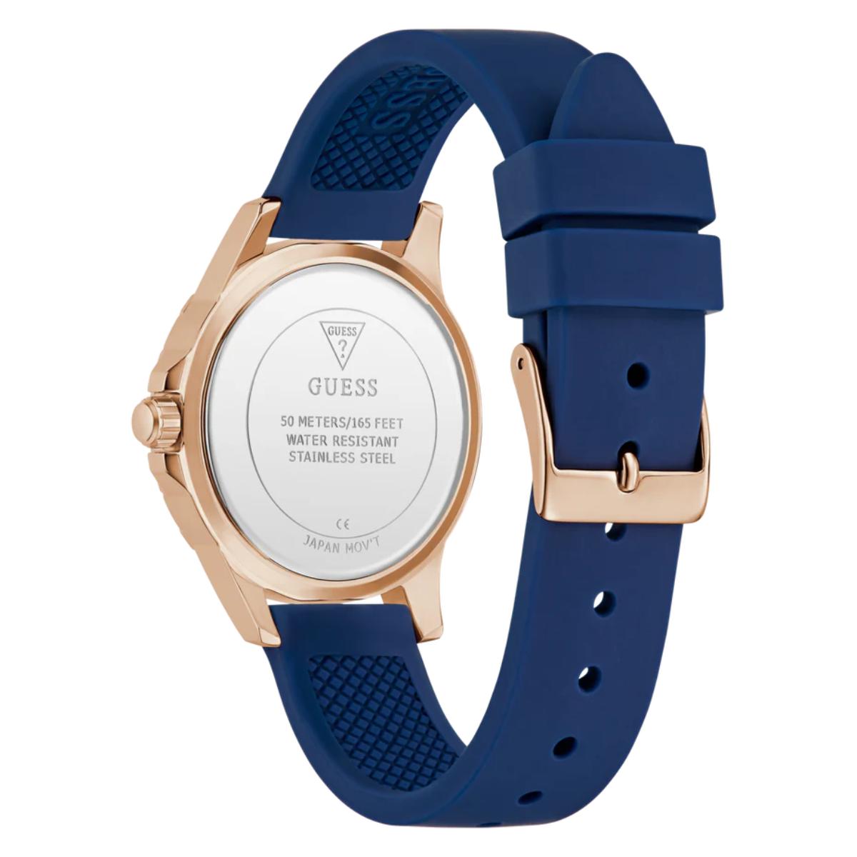 Guess watch with blue strap and rose gold case on white background
