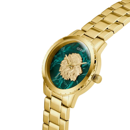 Gold watch with a green face and lion emblem on a white background