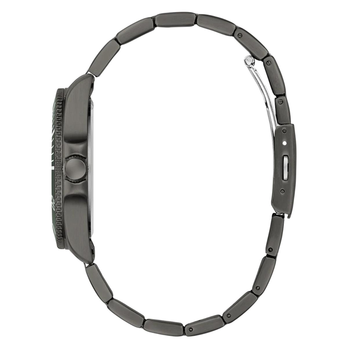 Close-up of a black watch with a detailed bezel on a white background