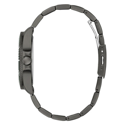 Close-up of a black watch with a detailed bezel on a white background