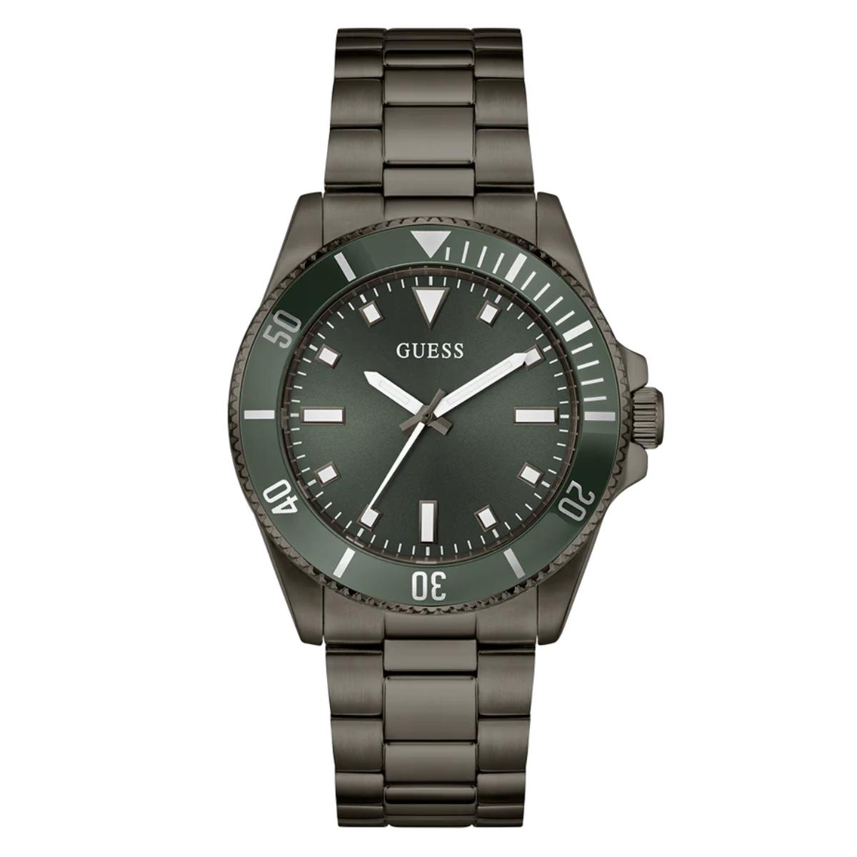 Guess watch with dark green dial and metallic band on a white background