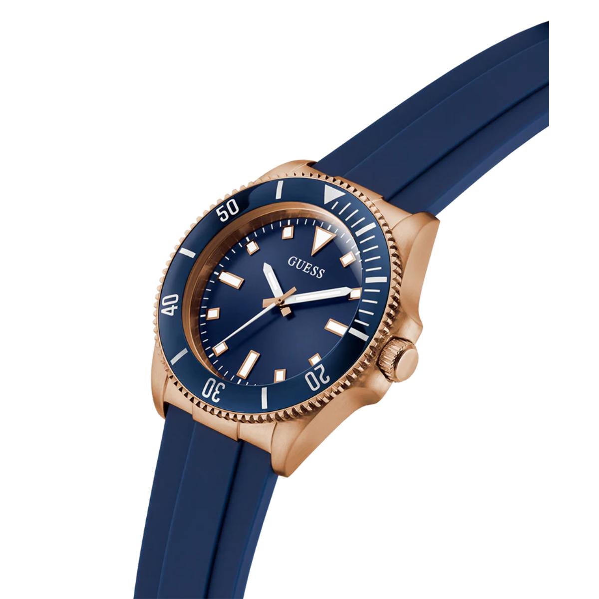 Blue watch with rose gold case and blue strap on white background