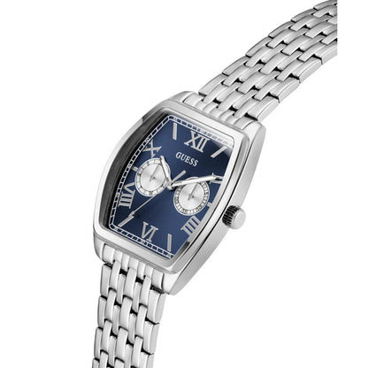 Silver watch with blue face and 'GUESS' branding on a white background