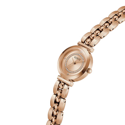 Rose gold watch with diamond-studded face on a white background