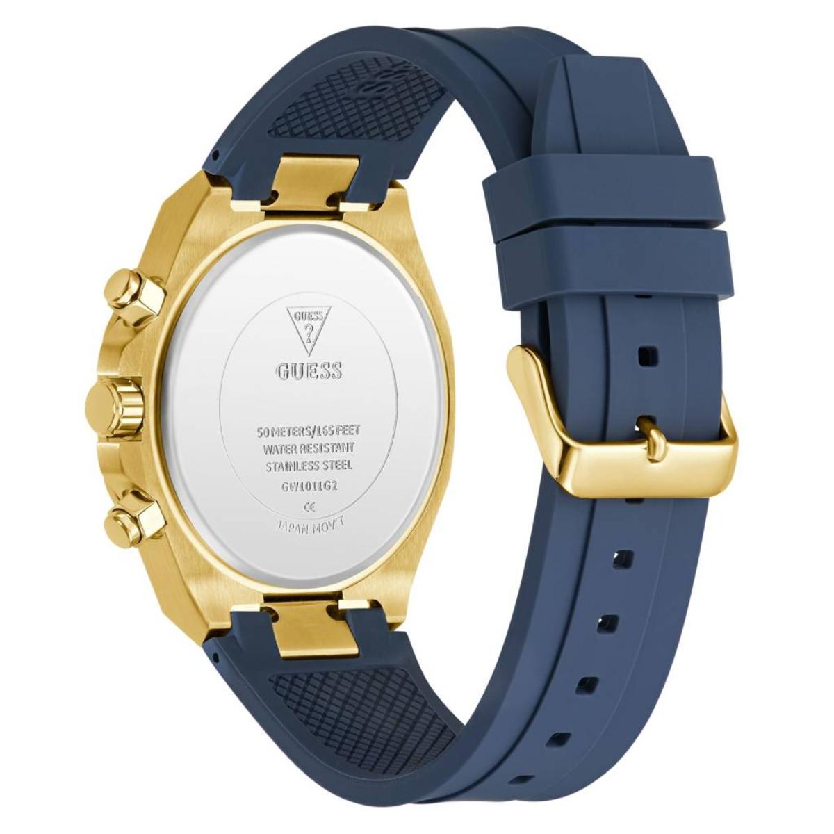 Gold and blue watch with visible Guess branding on a light gray background